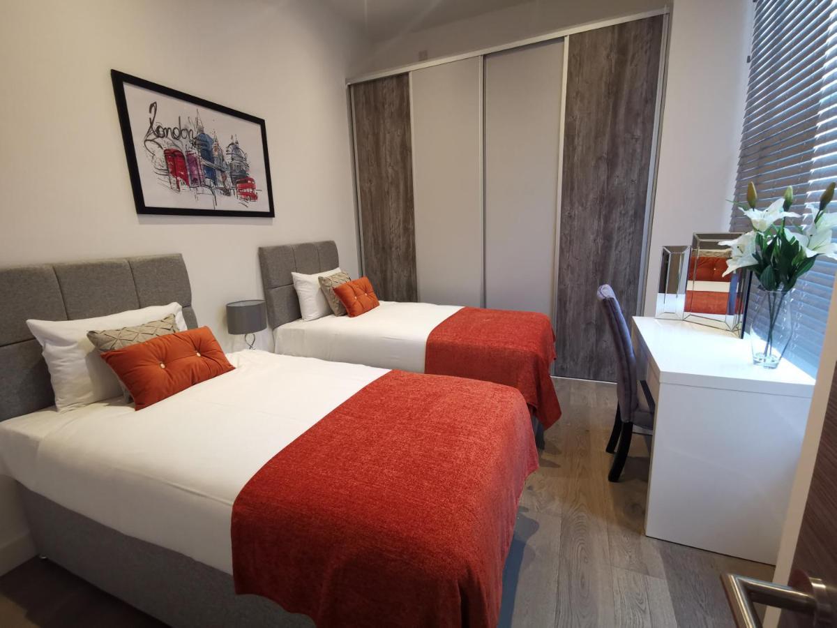 City Prime Apartments Londres Extérieur photo A typical bedroom at the hotel