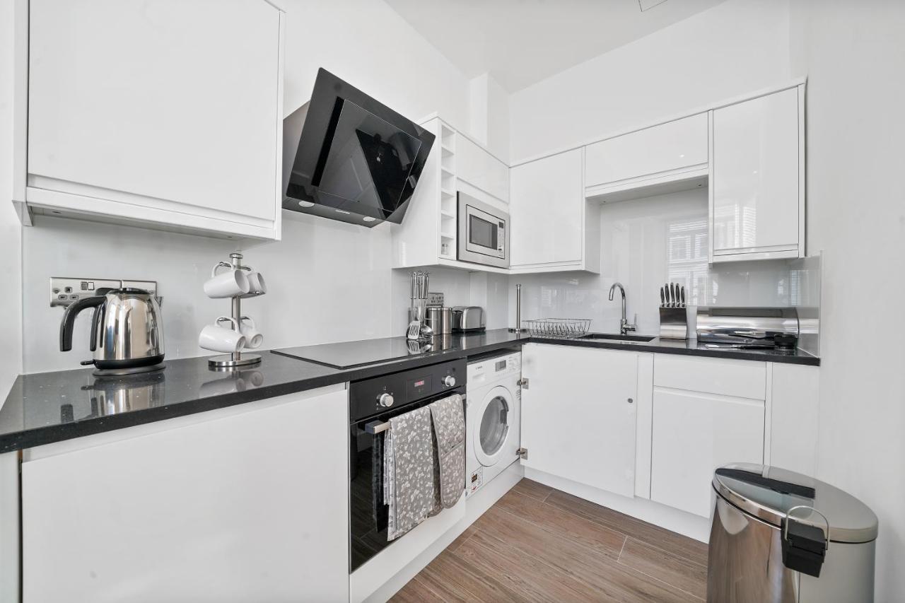 City Prime Apartments Londres Extérieur photo A typical kitchen in a student flat