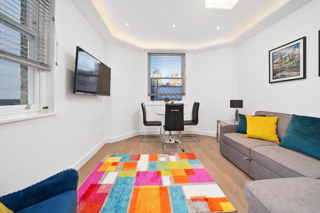 City Prime Apartments Londres Extérieur photo A living room in a serviced apartment in London