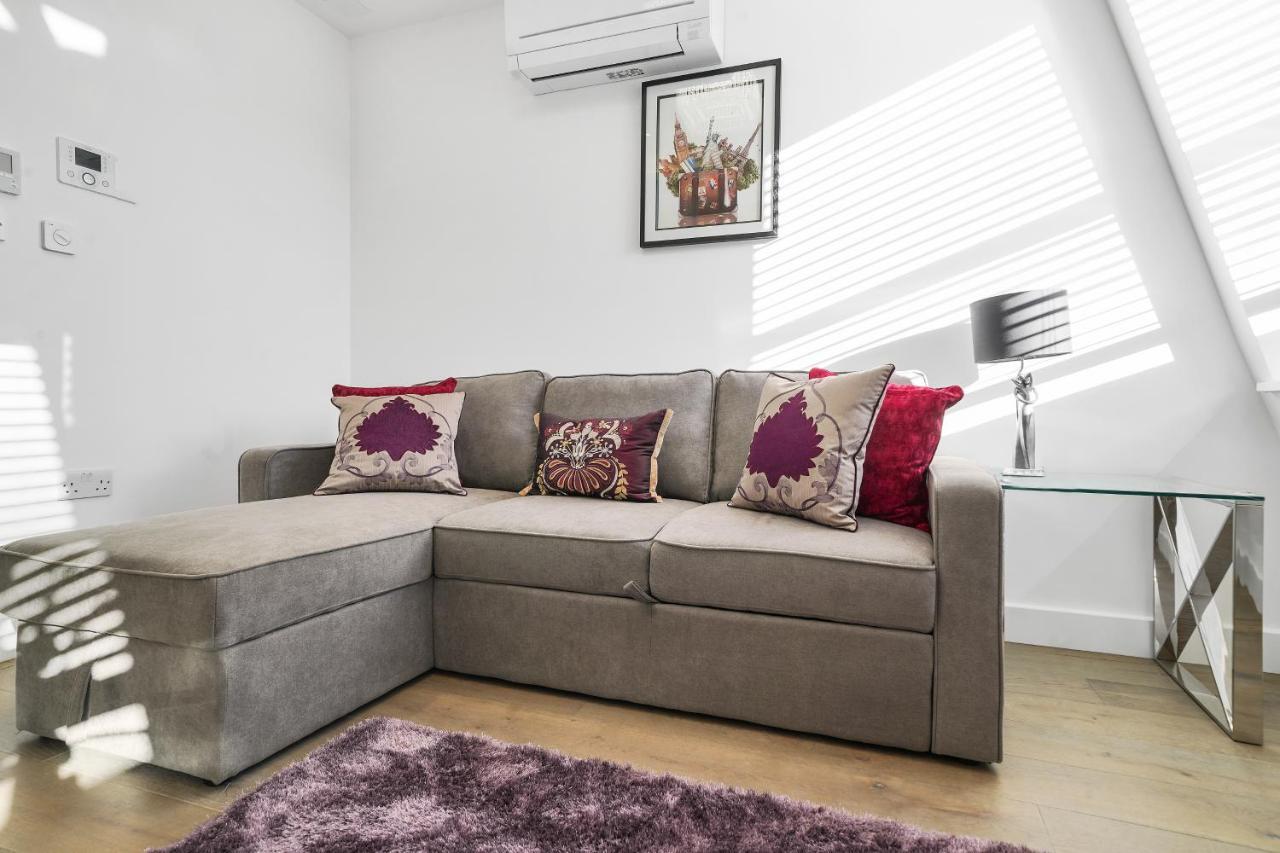 City Prime Apartments Londres Extérieur photo A sofa bed